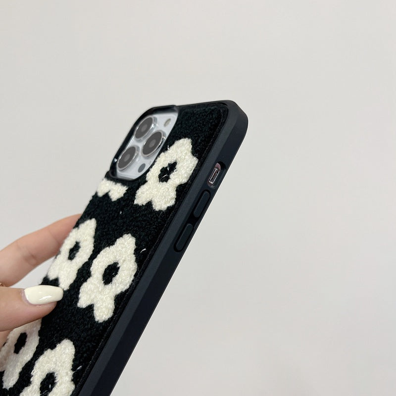 Étui à fleurs blanches